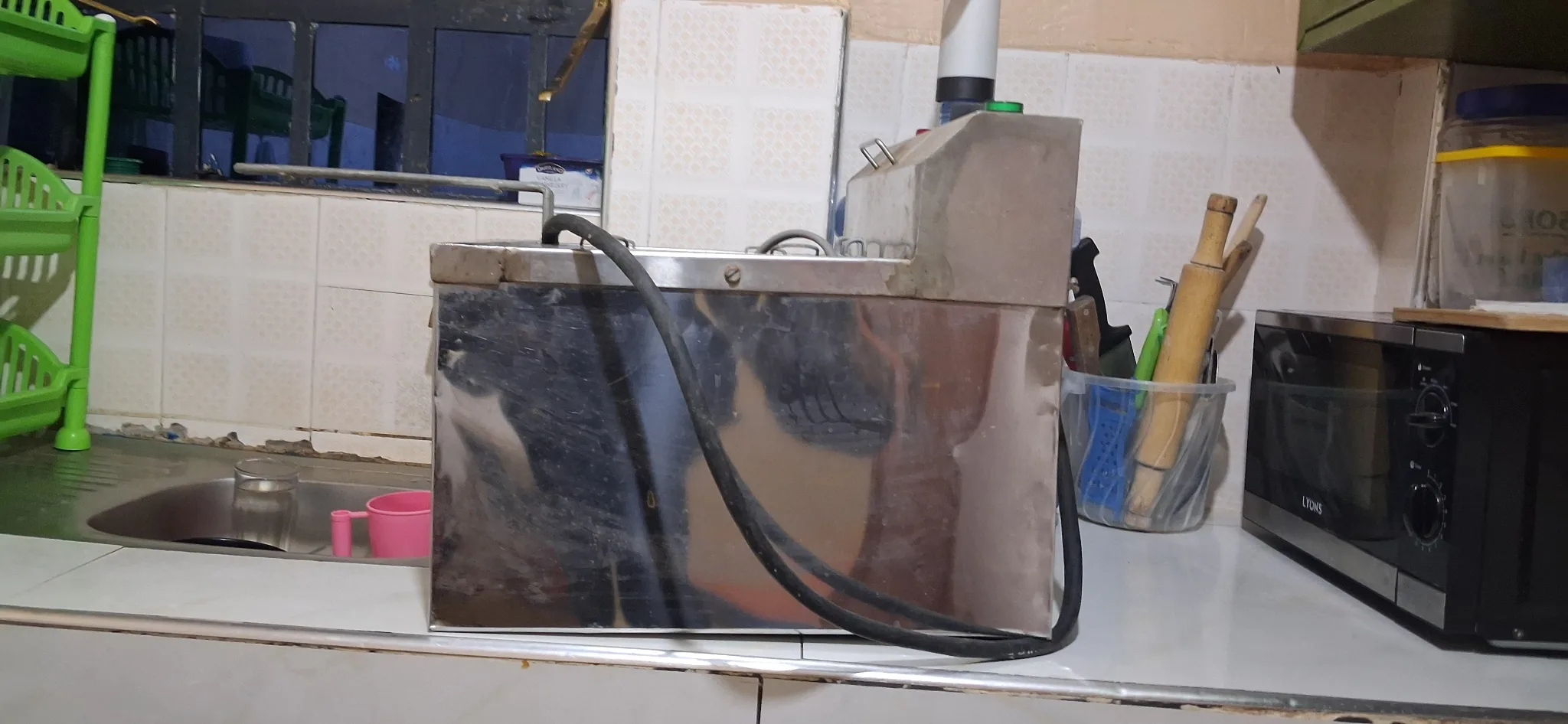 Deep fryer and it's stand, potato slicer, and food display cabinet. — good condition, Nairobi