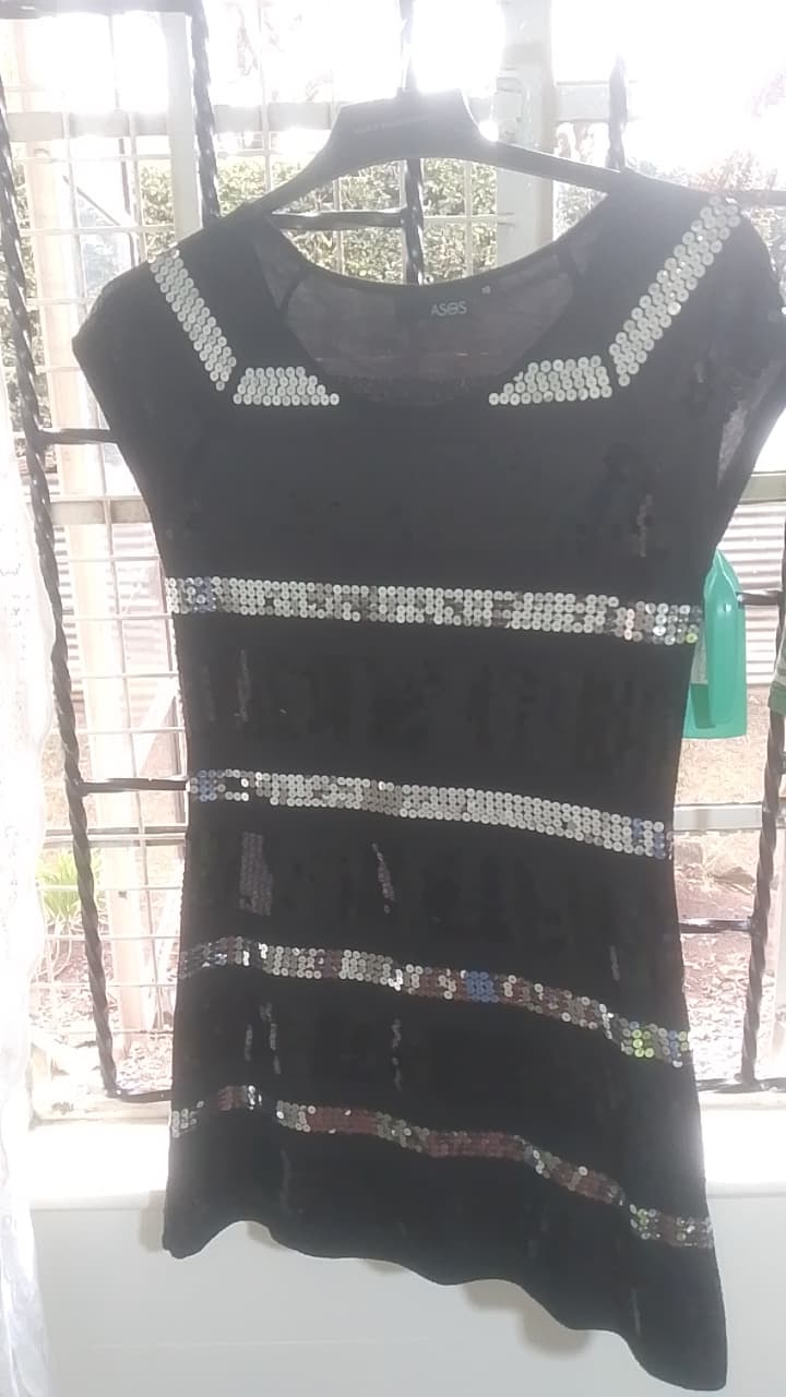 Black shiny dress top — good condition, Nairobi